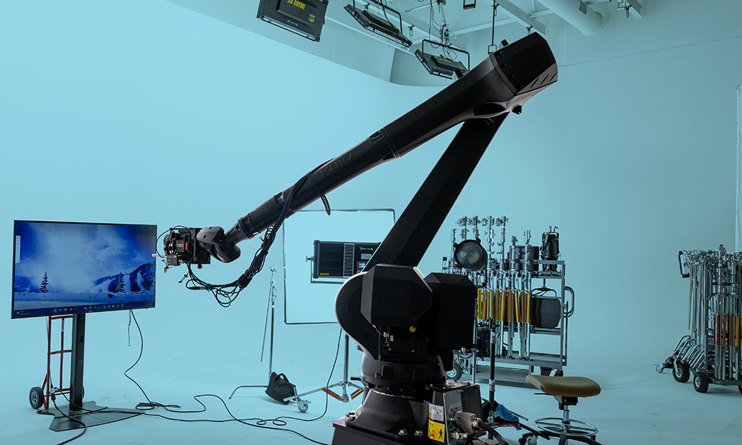 Photo of people using the Colossus cinema robot in a production